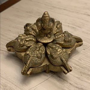 Indian dye holder with Ganesha metal